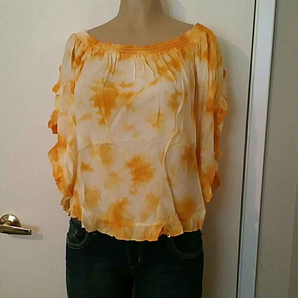 This top is truly gorgeous and it is new with tags